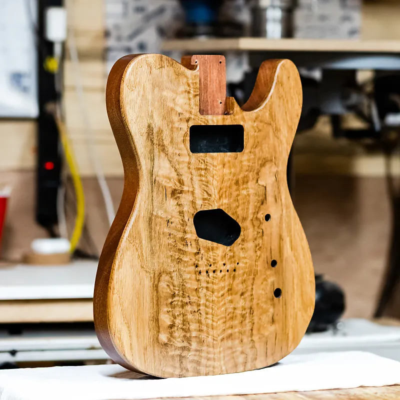 Knotty oak guitar